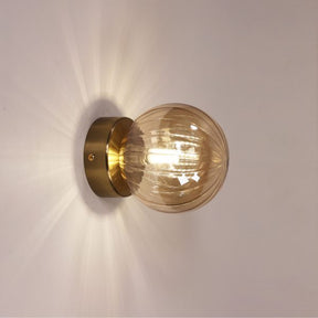 JUNI WALL LIGHT SATIN BRASS + AMBER