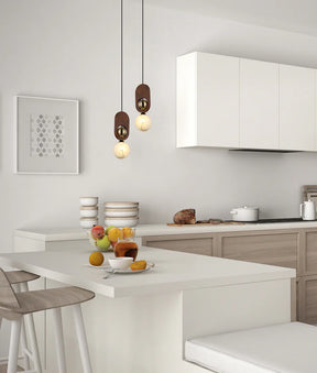 PALTA: Interior Sandblasted Opal Diffuser with Brass & Wood Highlight Pendant Lights